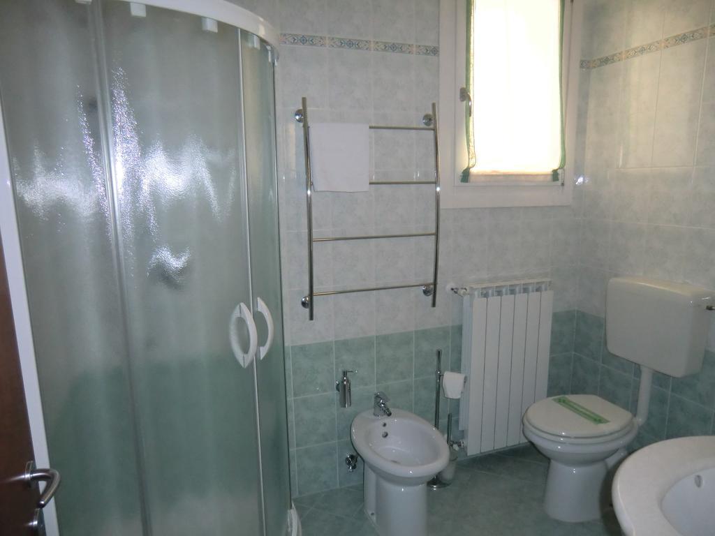 Residence Elisa Piano Terra Con Giardino E Posto Spiaggia Incluso Caorle Zimmer foto